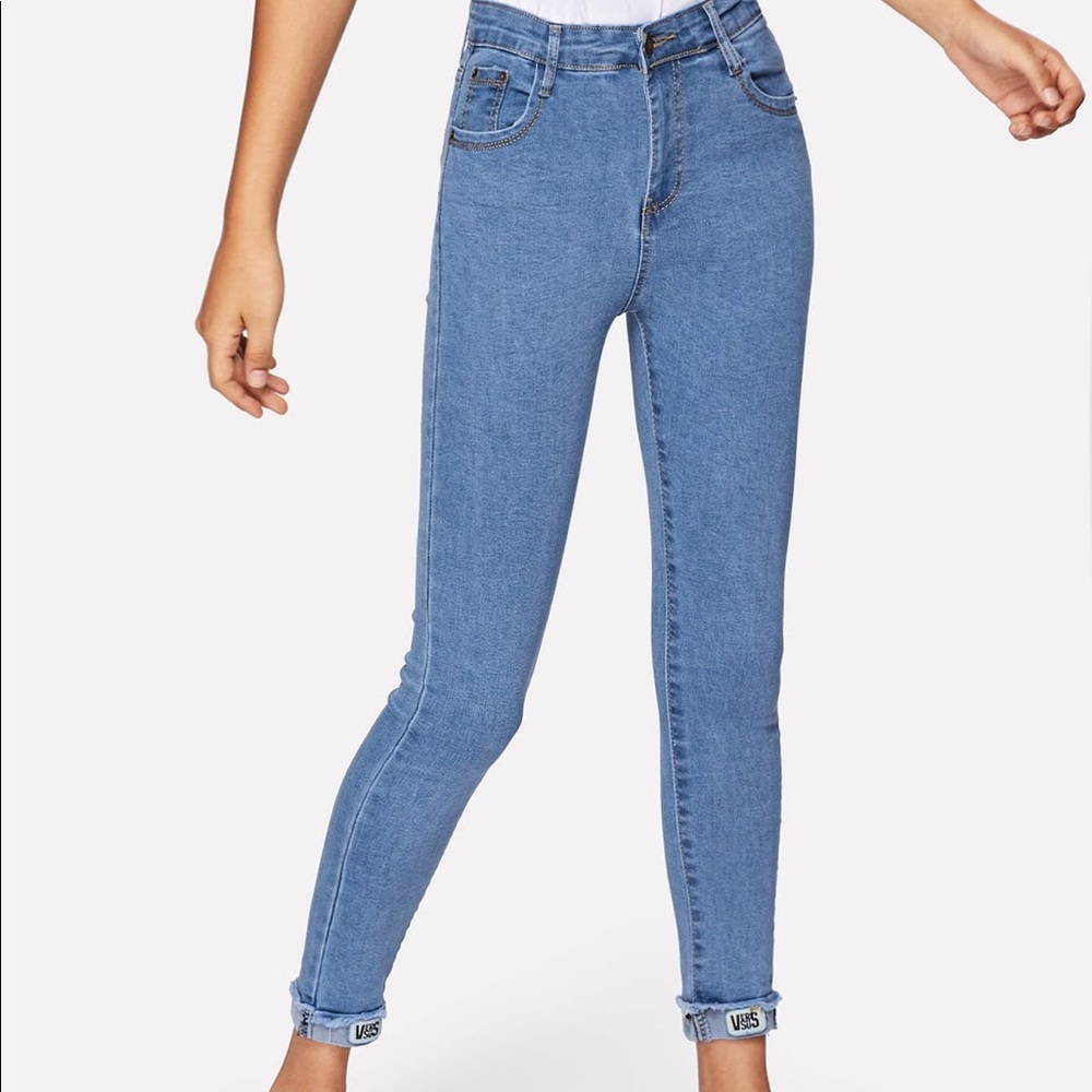 NEW. Mid waist roll up skinny jeans